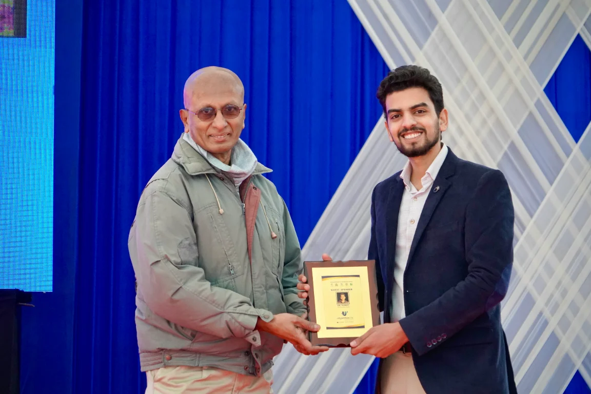 Dr. Puneet (Medical Director, Cure For Eyes) being awarded by IIT Jammu